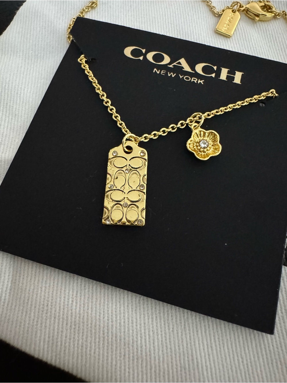 Coach Gold-Tone Logo Tag and Flower Charm Necklace - Picture 5 of 7